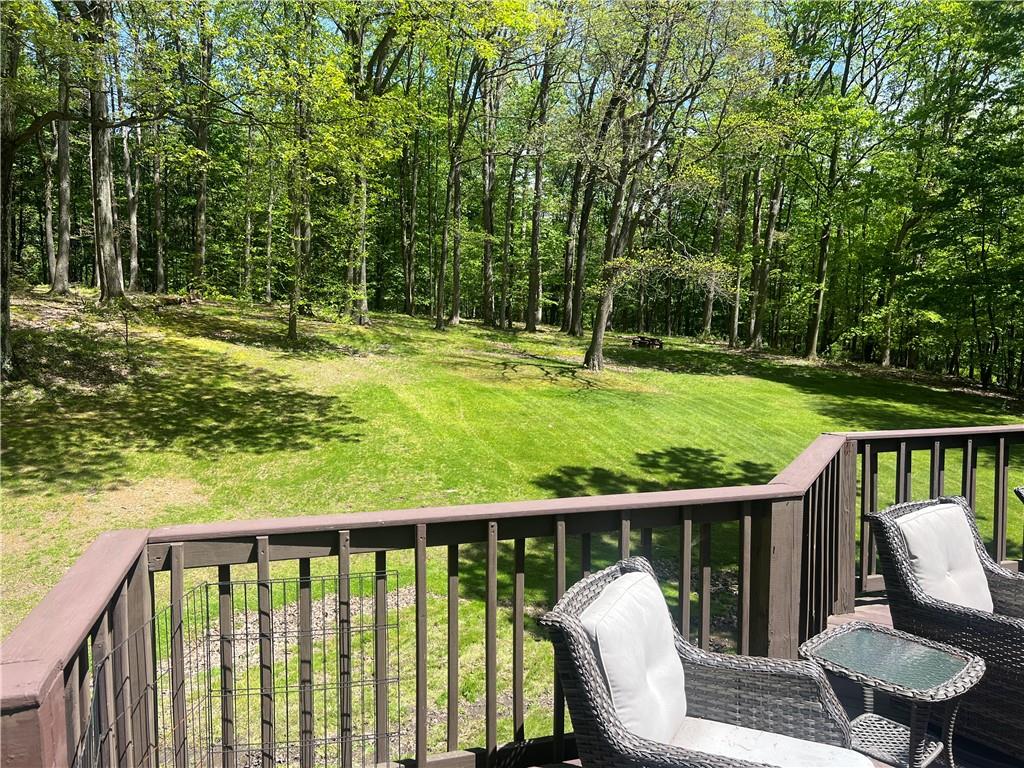 121 Pitts Road Jamestown, PA 16134 - Photo 11 of 28 a view of a chair and table on the deck