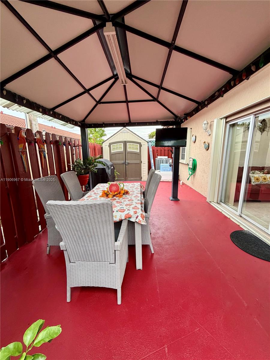 13778 Southwest 170th Lane Miami, FL 33177 - Photo 20 of 23 a bed room with furniture and window