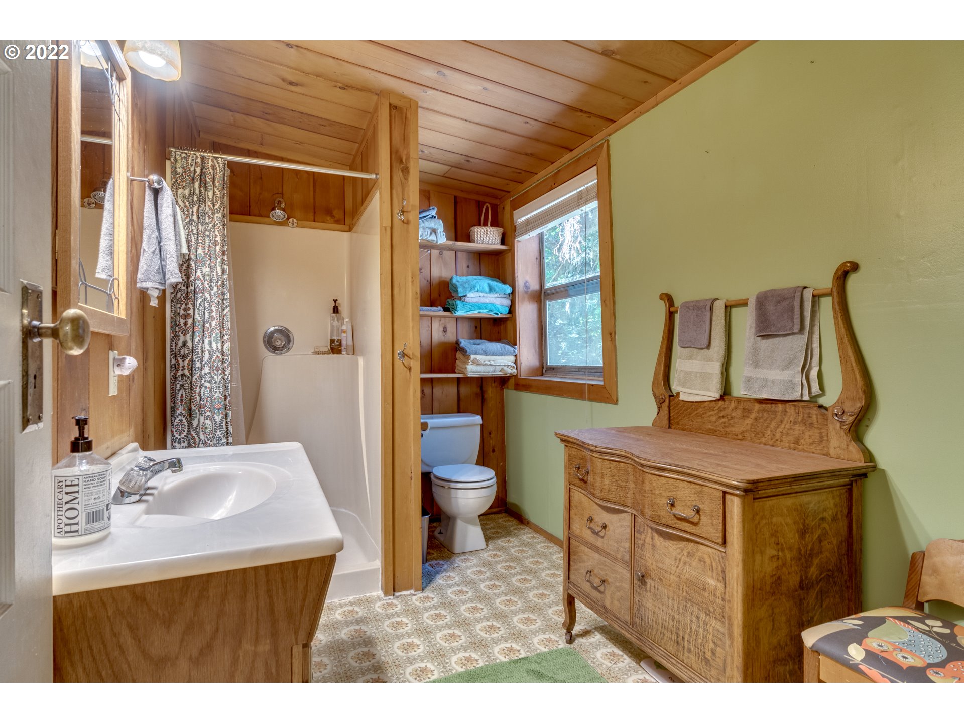 29018 Road 20, Unit LOT67 Rhododendron, OR 97049 - Photo 21 of 31 a bathroom with a sink a toilet and shower