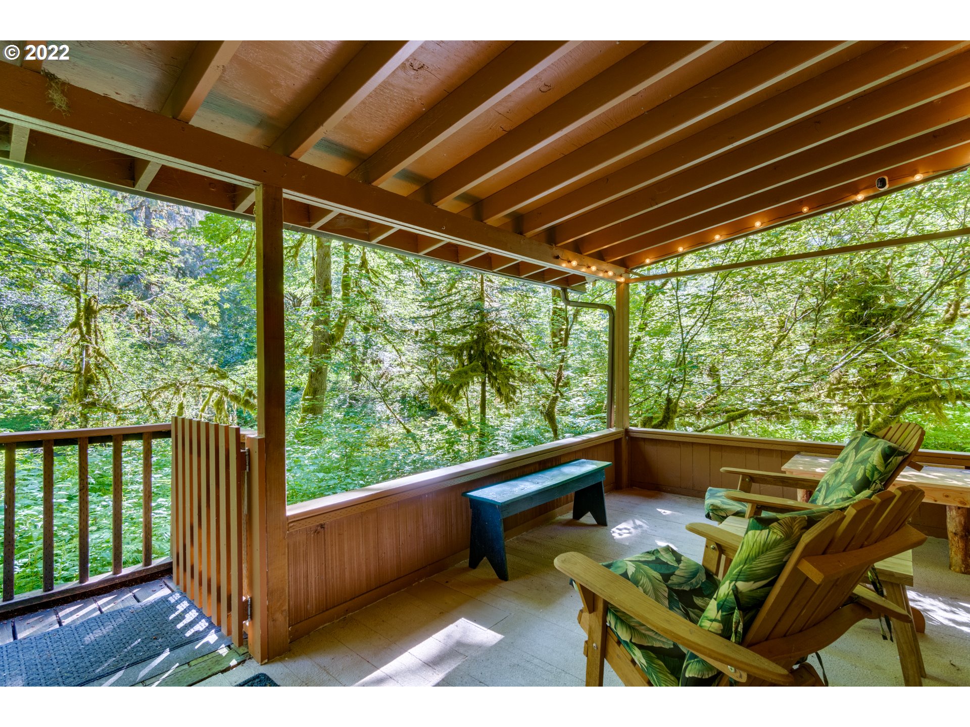 29018 Road 20, Unit LOT67 Rhododendron, OR 97049 - Photo 6 of 31 a view of a patio with table and chairs