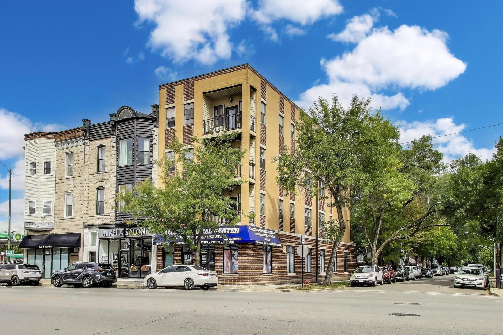 a view of a street with cars