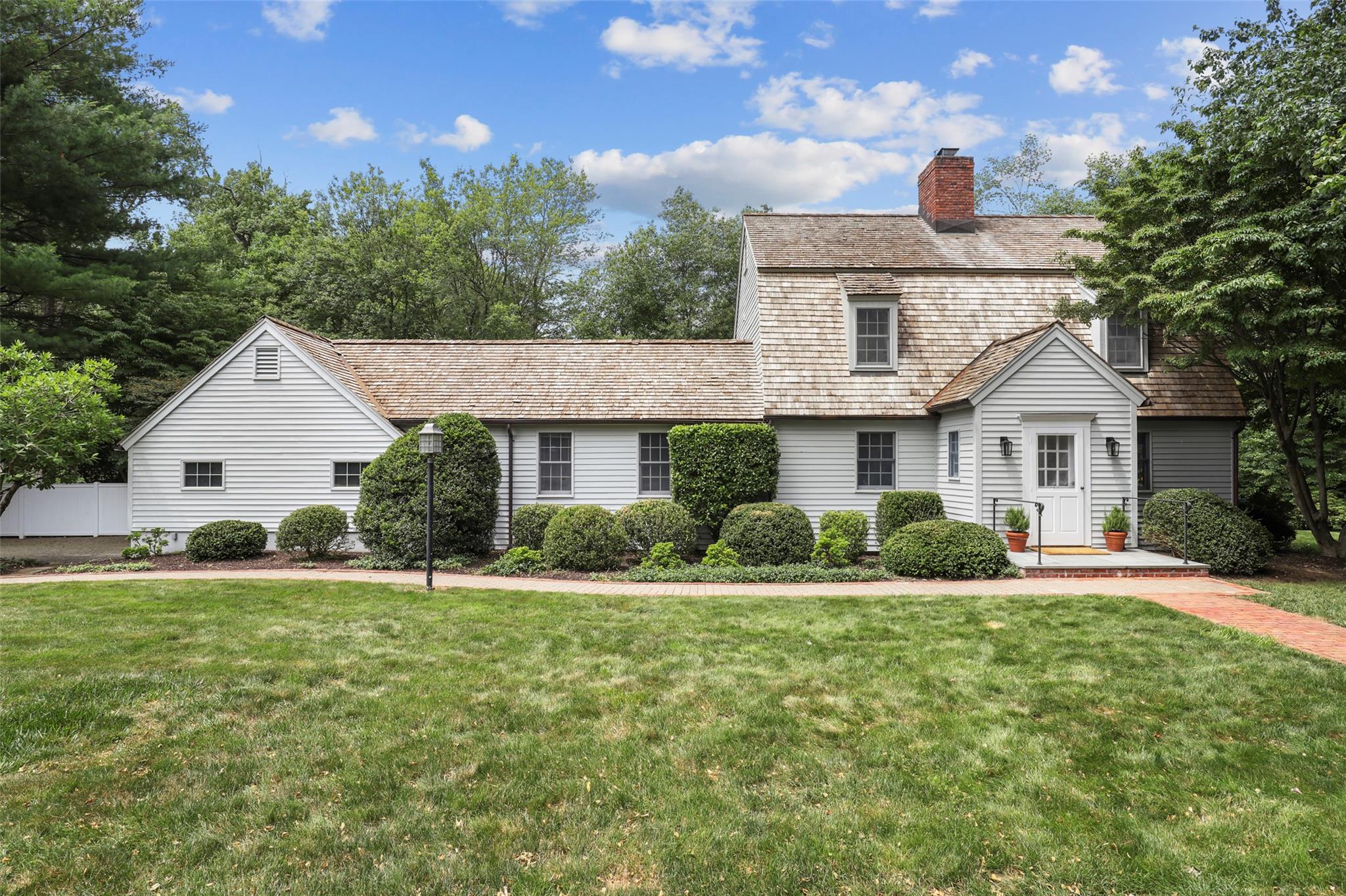 6 Hunt Farm Road Waccabuc, NY 10597 - Photo 1 of 1 Front of the house with walkway and welcoming entryway