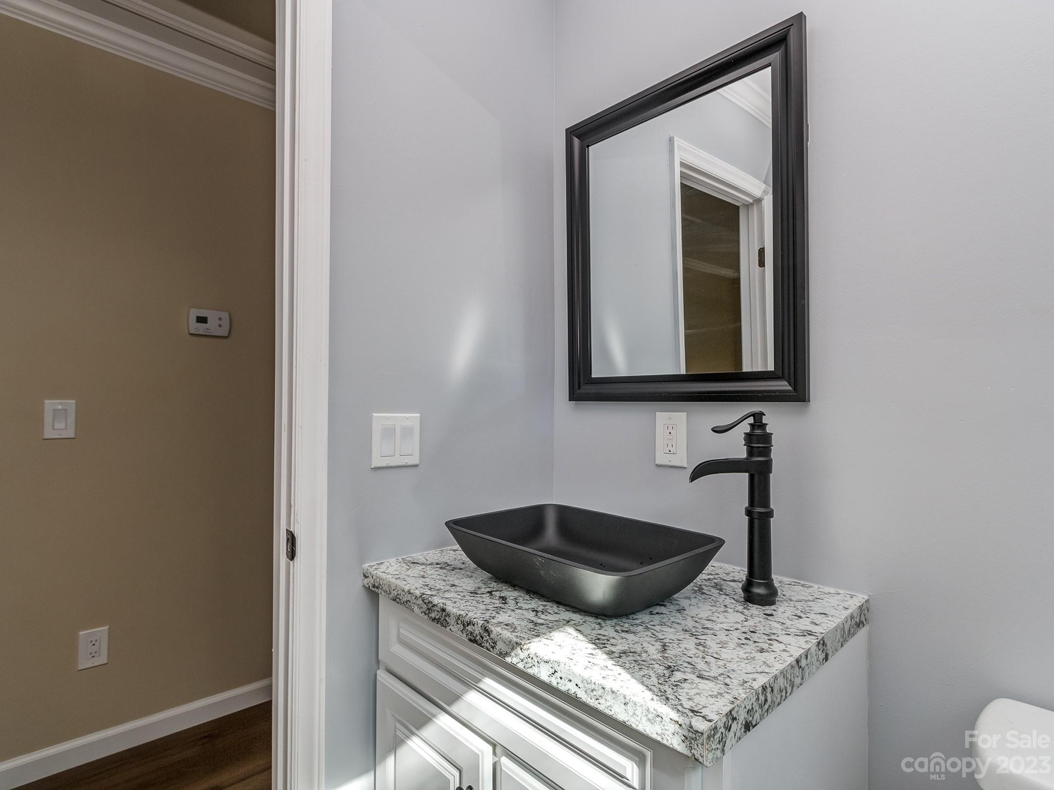 1031 State Rd S-29-424 Lancaster, SC 29720 - Photo 12 of 47 a kitchen with a sink and a stove