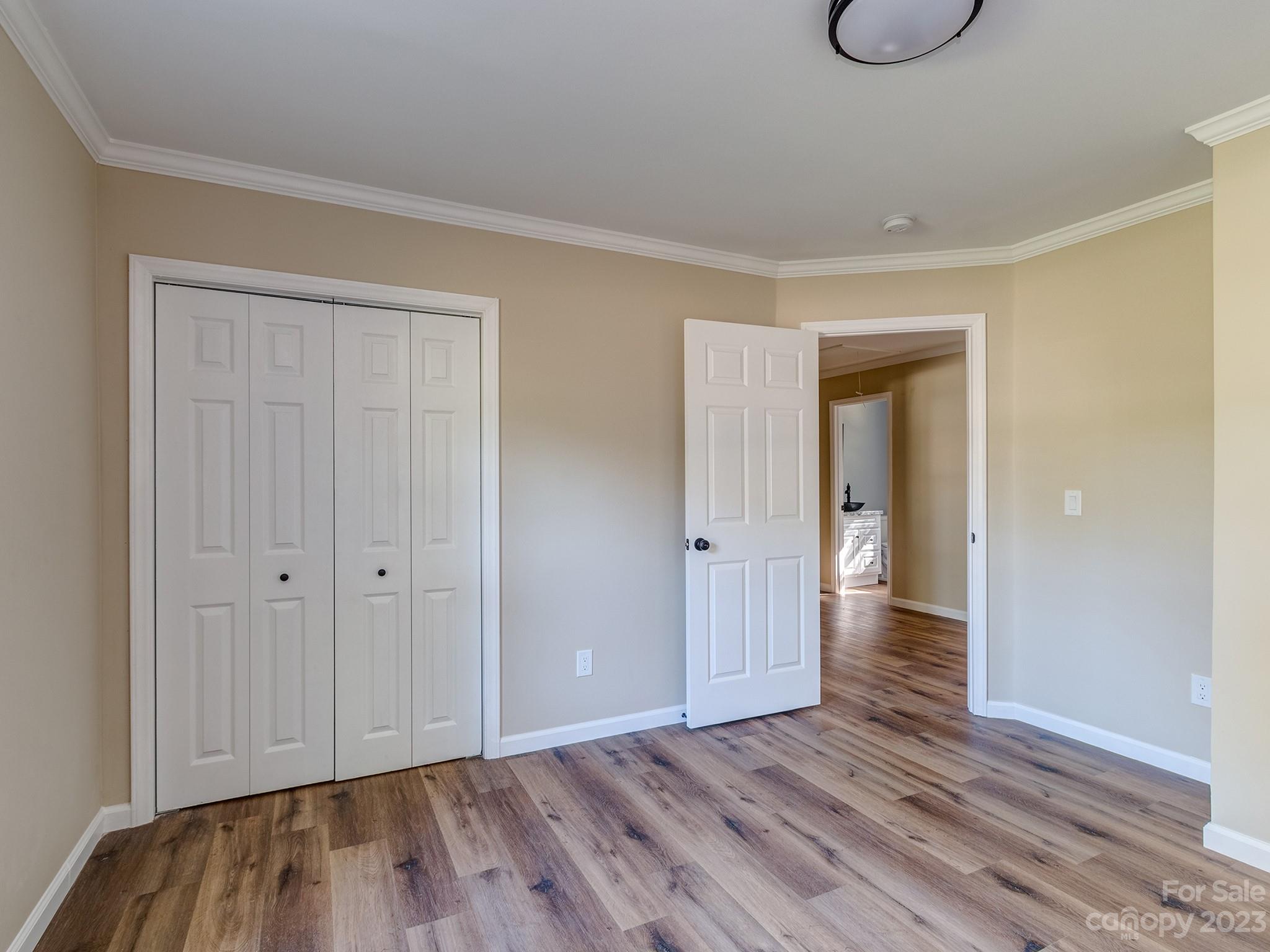 1031 State Rd S-29-424 Lancaster, SC 29720 - Photo 14 of 47 a view of an empty room and wooden floor