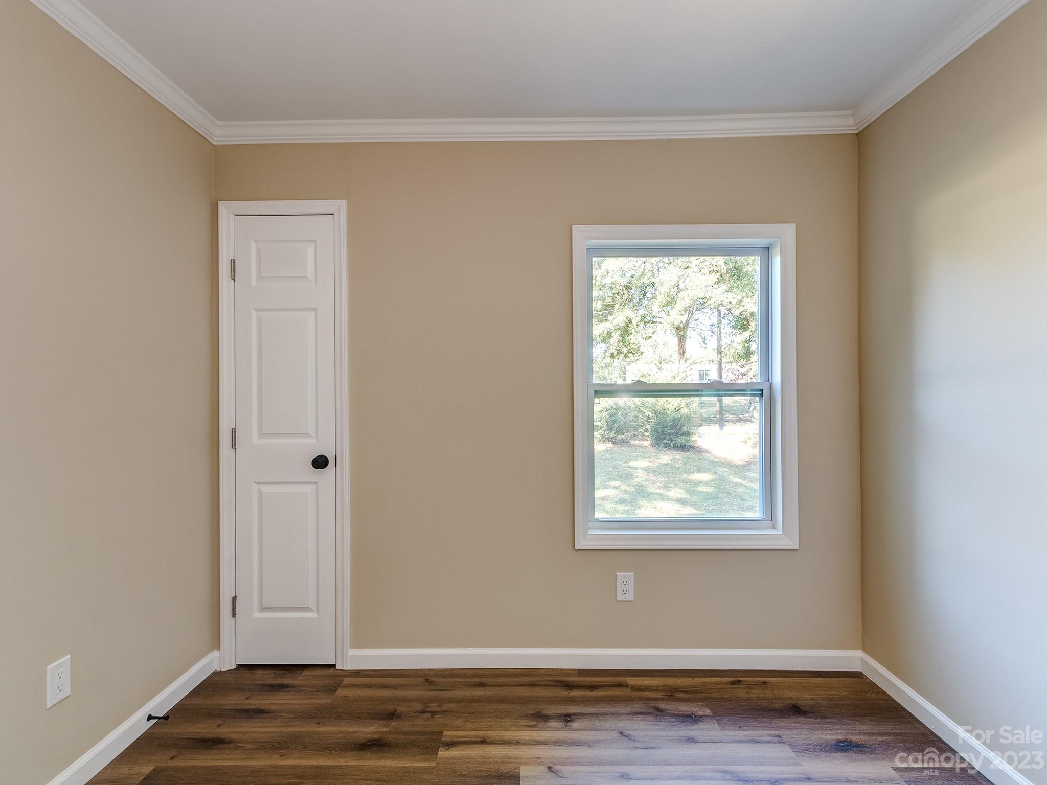 1031 State Rd S-29-424 Lancaster, SC 29720 - Photo 16 of 47 a view of room with window and wooden floor
