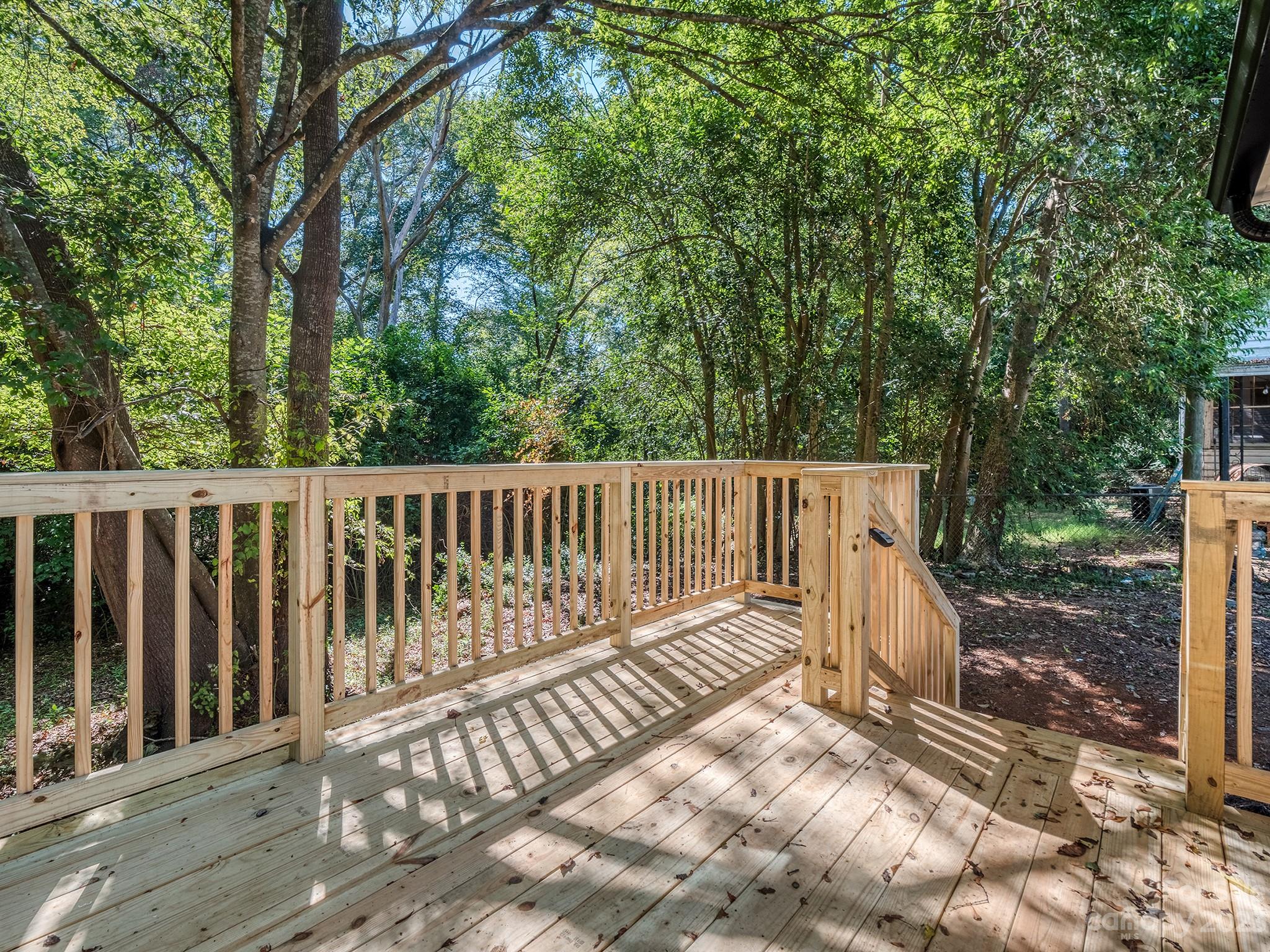 1031 State Rd S-29-424 Lancaster, SC 29720 - Photo 19 of 47 a view of deck with wooden floor and fence
