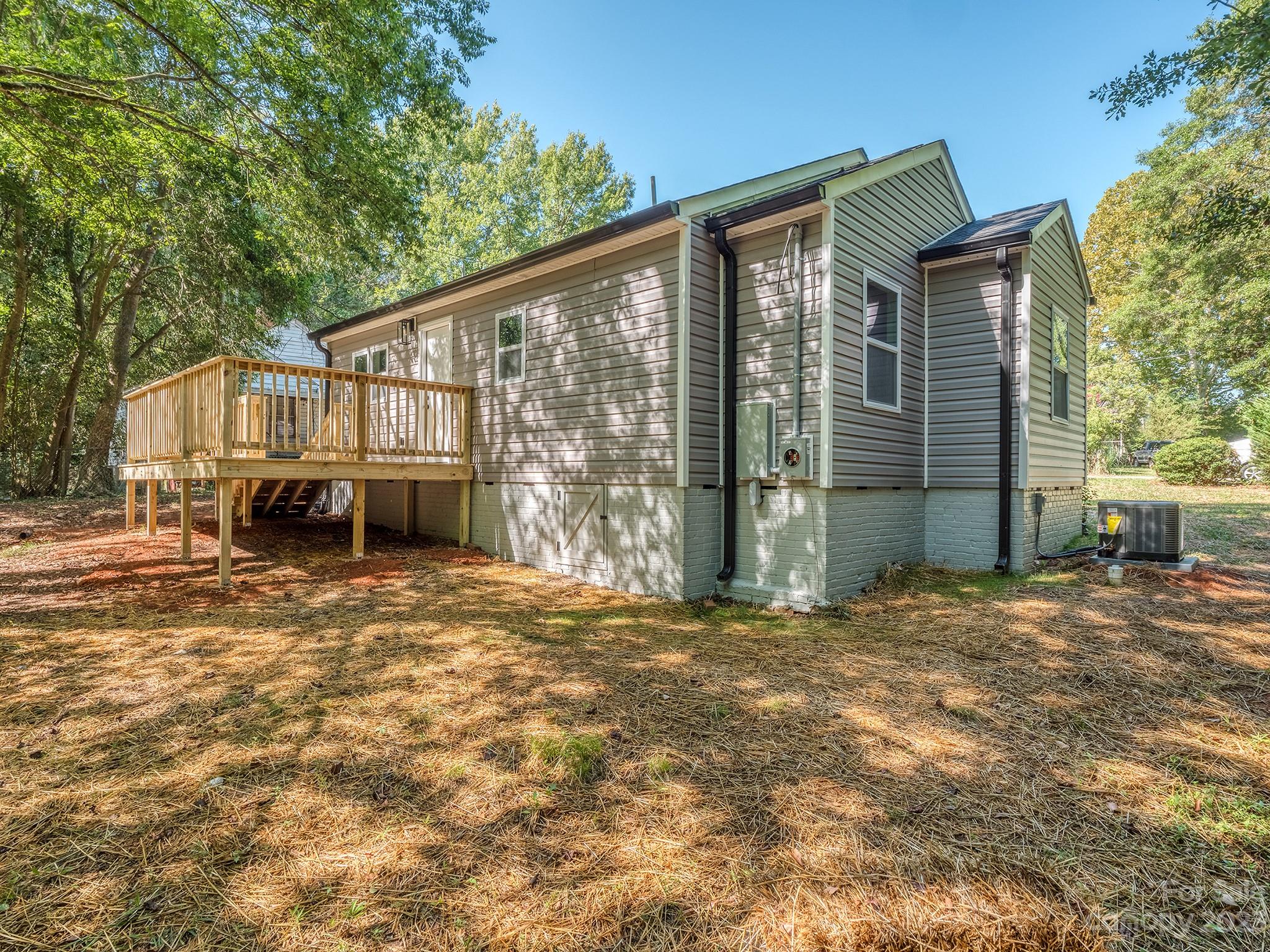 1031 State Rd S-29-424 Lancaster, SC 29720 - Photo 23 of 47 a front view of a house with a garden