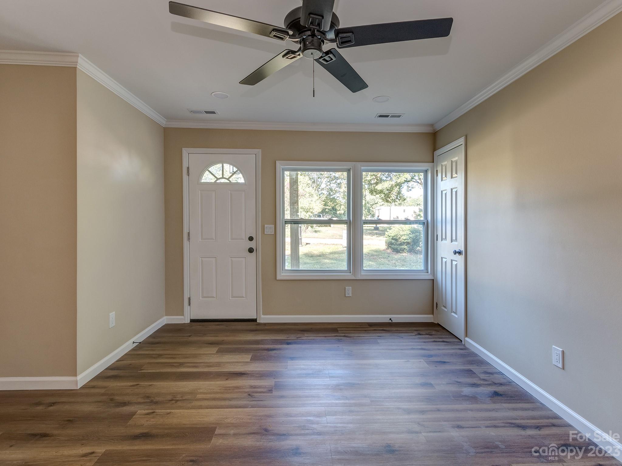 1031 State Rd S-29-424 Lancaster, SC 29720 - Photo 4 of 47 wooden floor in an empty room with a window