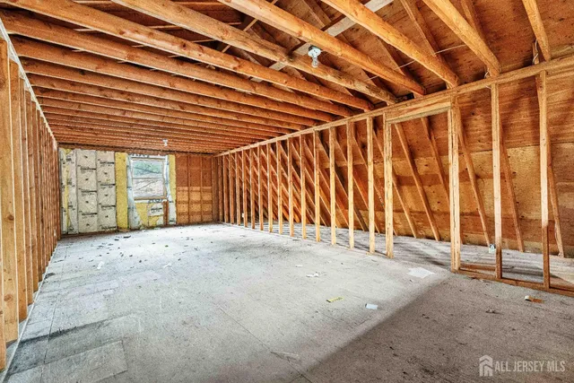a view of backyard with deck and wooden floor