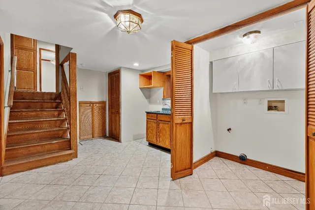a view of an entryway with wooden floor