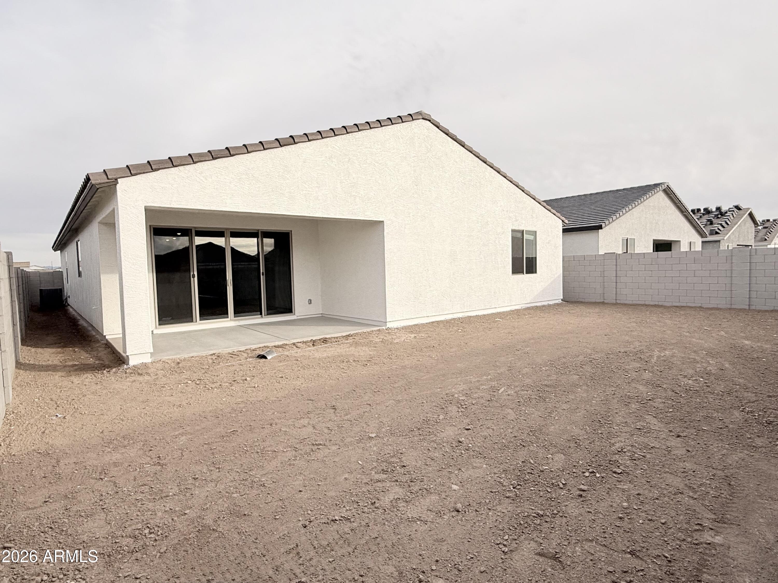32148 Buckaroo Road San Tan Valley, AZ 85140 - Photo 21 of 45 a view of a house with a backyard