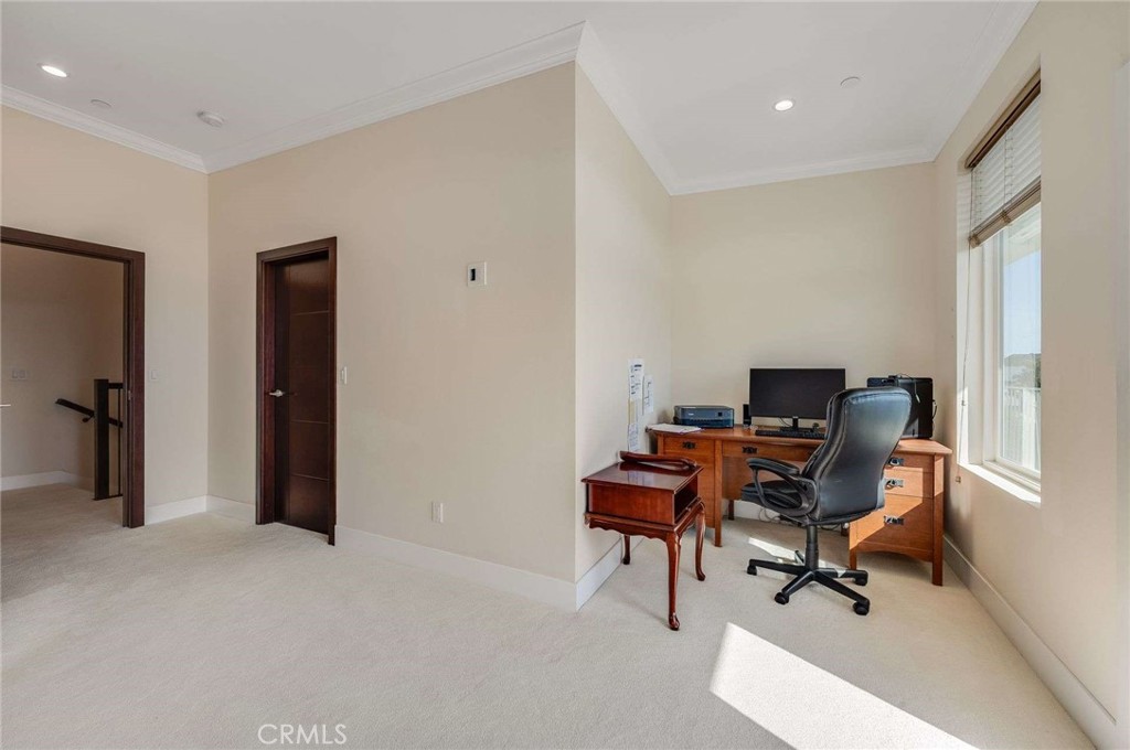 11837 Rideout Way Whittier, CA 90601 - Photo 23 of 44 a view of a workspace with furniture and a window