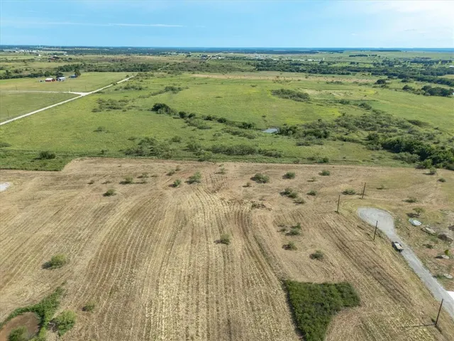 a view of a lake with beach
