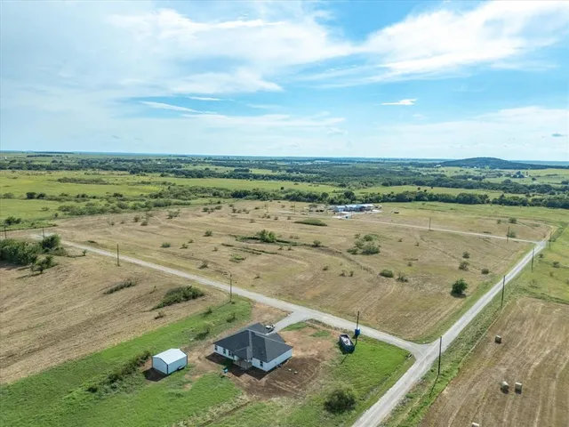 a view of a lake with a big yard
