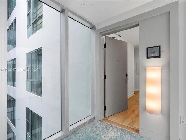 a view of an entryway with a livingroom