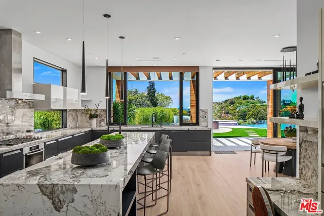 a bedroom with a bed and a potted plant
