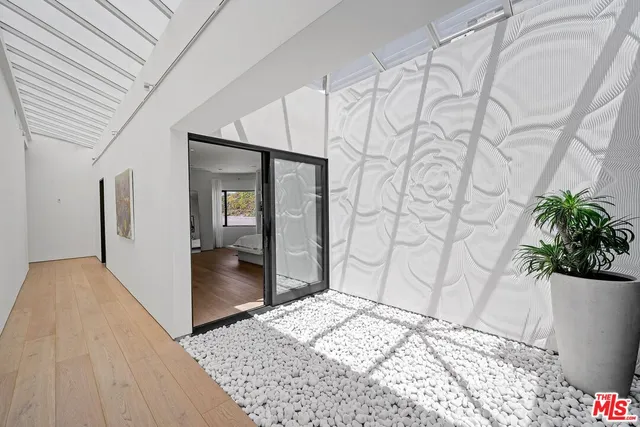 a living room with furniture fireplace and flat screen tv