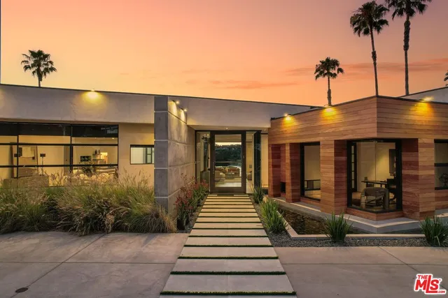 a view of a building with a potted plant