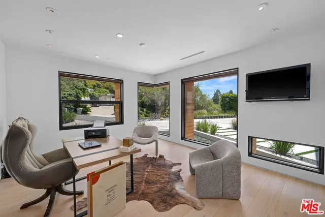 a view of a livingroom with furniture
