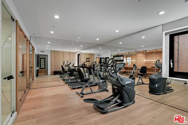 a utility room with sink dryer and washer
