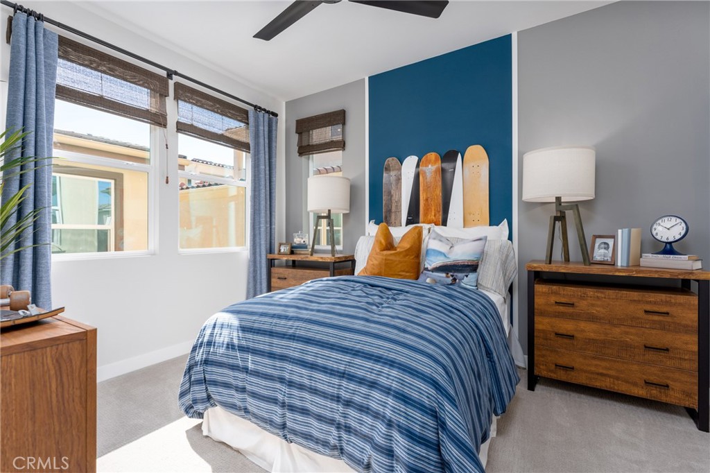 263 Siena Lake Forest, CA 92630 - Photo 17 of 51 a bedroom with a bed and wooden floor