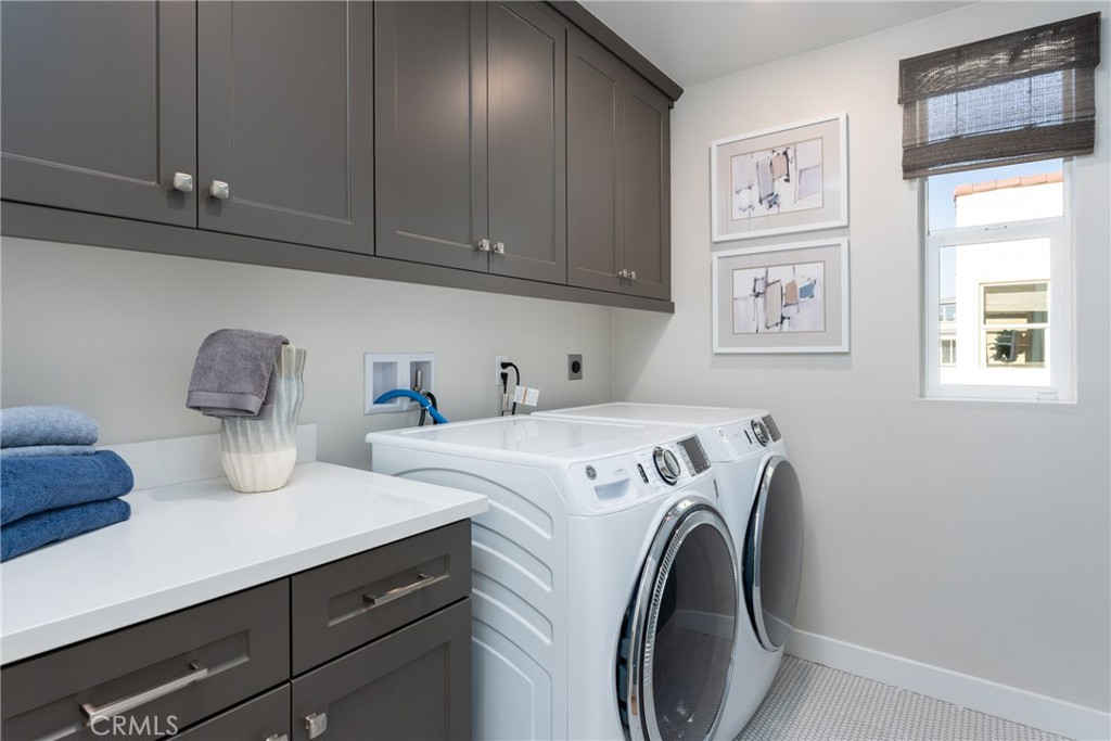 263 Siena Lake Forest, CA 92630 - Photo 19 of 51 a utility room with dryer and washer