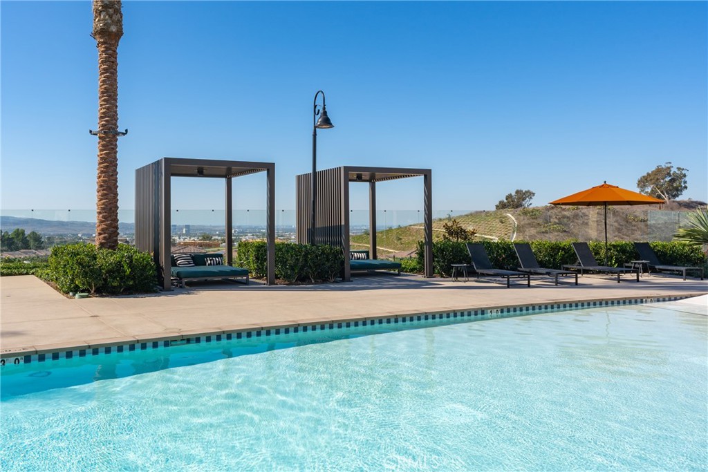 263 Siena Lake Forest, CA 92630 - Photo 38 of 51 a view of a swimming pool with a yard
