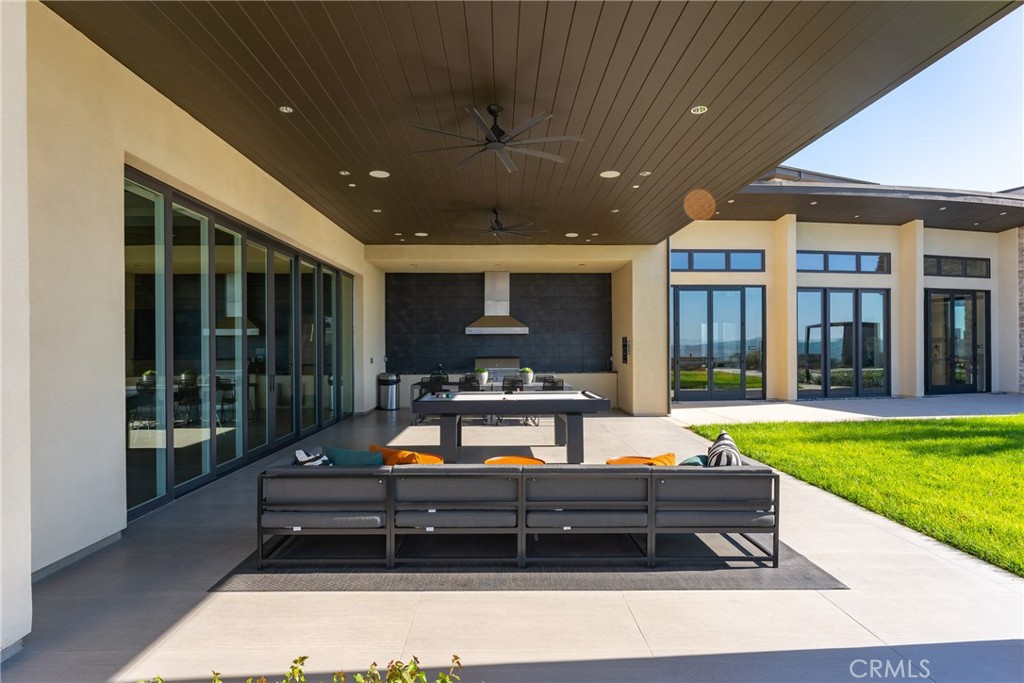 263 Siena Lake Forest, CA 92630 - Photo 49 of 51 a outdoor sitting area with furniture and garden