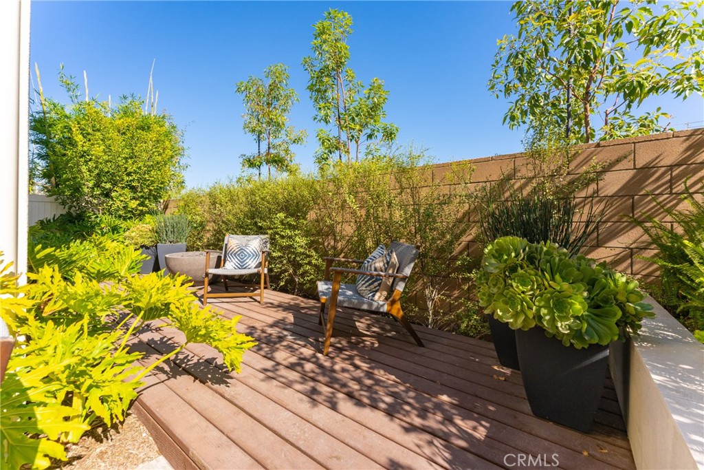 263 Siena Lake Forest, CA 92630 - Photo 7 of 51 a view of a backyard with chairs and a flower pot