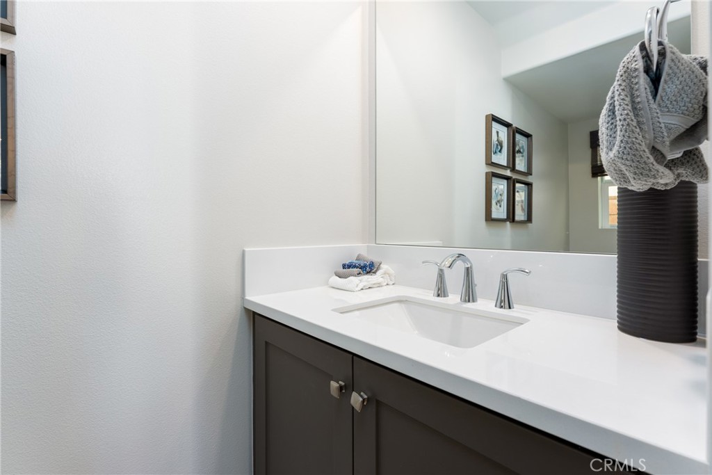 263 Siena Lake Forest, CA 92630 - Photo 10 of 51 a bathroom with a sink and a mirror