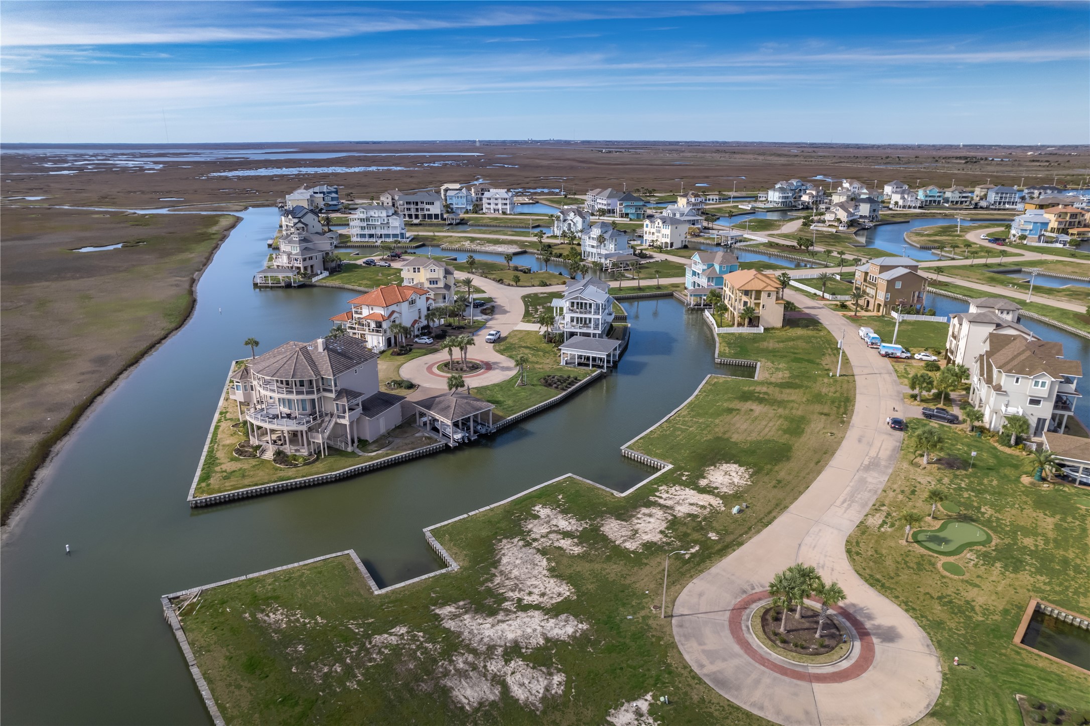 27 Half Moon Hitchcock, TX 77563 - Photo 18 of 24 an aerial view of a house with a lake view