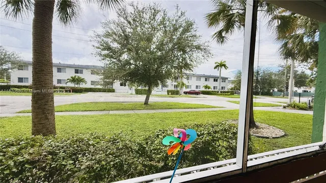 a swimming pool with outdoor seating and outdoor seating