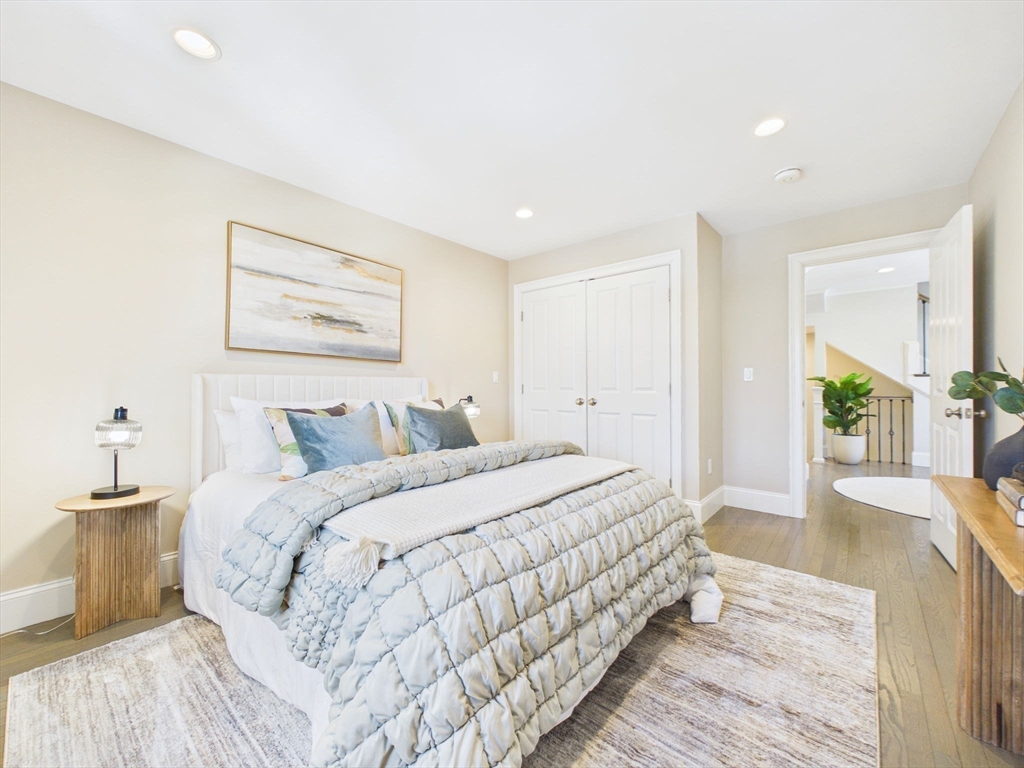 36 Troy Lane Newton, MA 02468 - Photo 13 of 42 a large white bed in a white room
