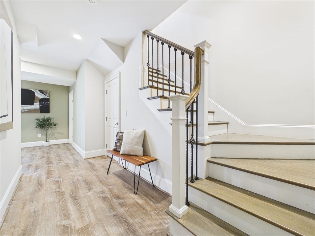 36 Troy Lane Newton, MA 02468 - Photo 26 of 42 a view of entryway and hall with wooden floor