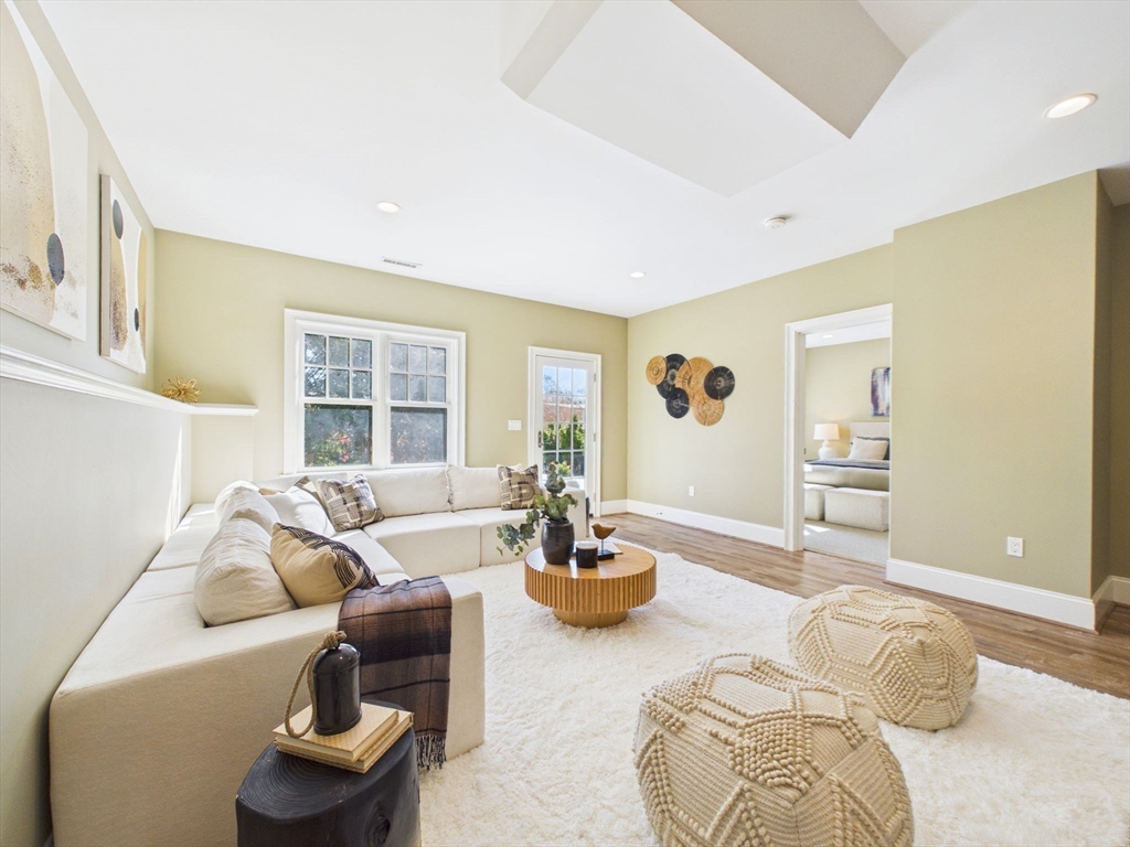 36 Troy Lane Newton, MA 02468 - Photo 29 of 42 a living room with furniture and a large window