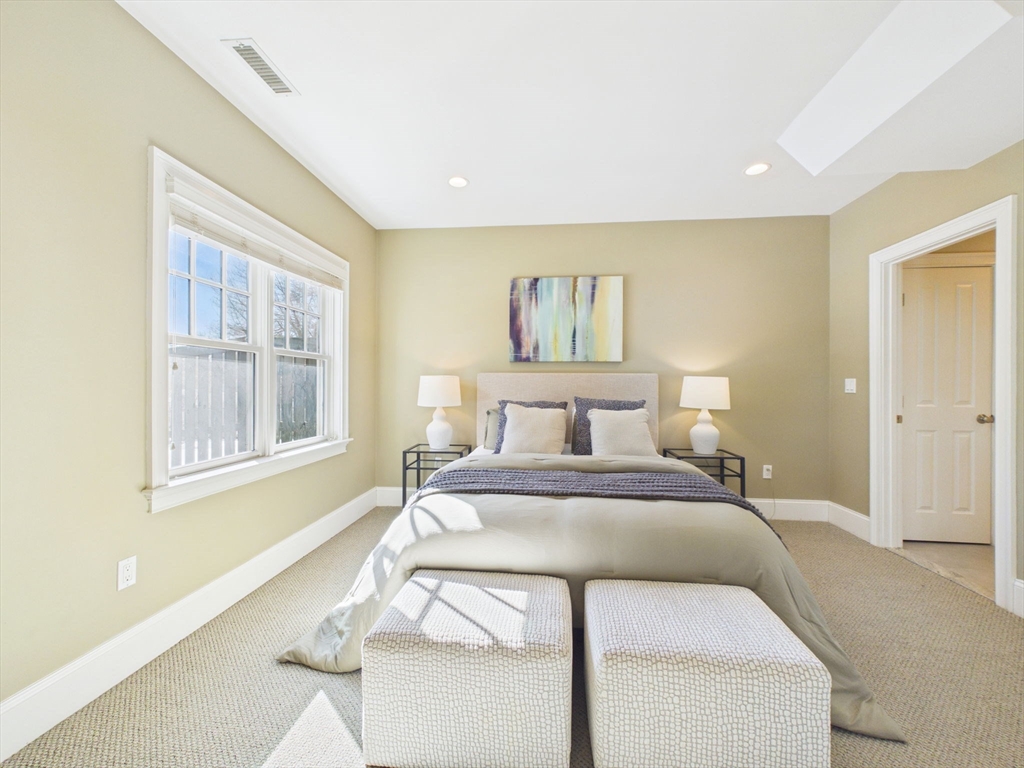 36 Troy Lane Newton, MA 02468 - Photo 30 of 42 a bedroom with a bed and a window