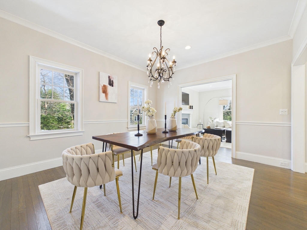 36 Troy Lane Newton, MA 02468 - Photo 3 of 42 a view of a dining room with furniture window and wooden floor