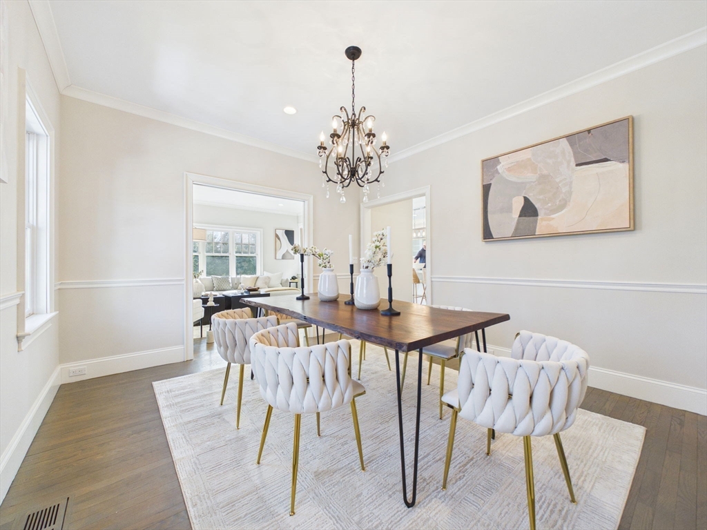 36 Troy Lane Newton, MA 02468 - Photo 4 of 42 a view of a dining room with furniture and chandelier