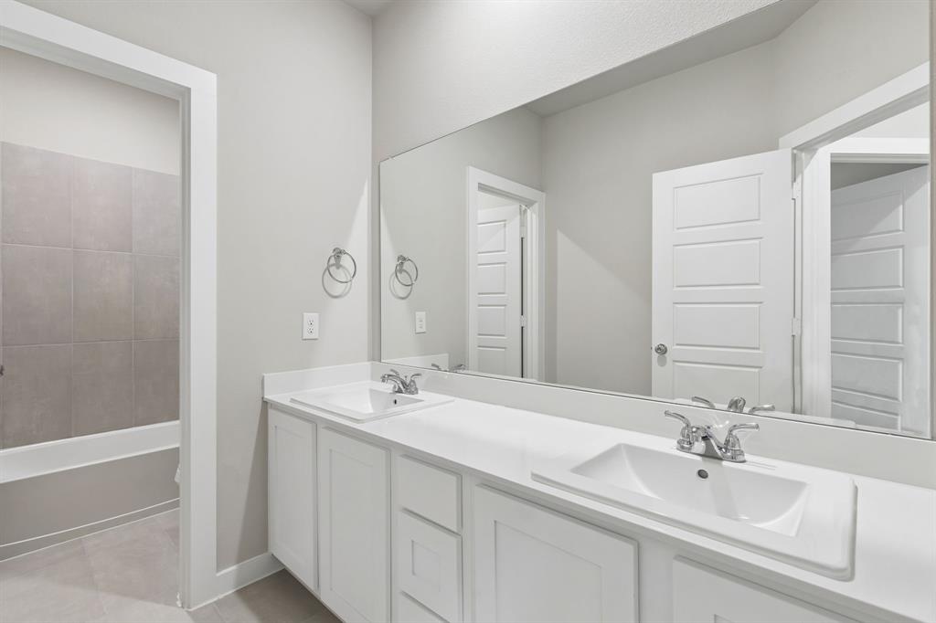 2303 Wind River Road Princeton, TX 75407 - Photo 25 of 32 Bathroom in the Winters home plan by Trophy Signature Homes – REPRESENTATIVE PHOTO