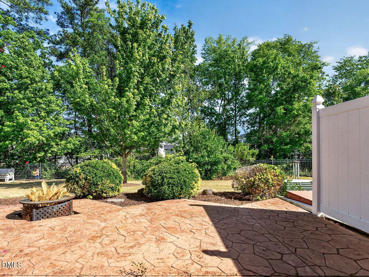 8215 Yaxley Hall Drive Raleigh, NC 27616 - Photo 29 of 42 a view of a backyard of the house