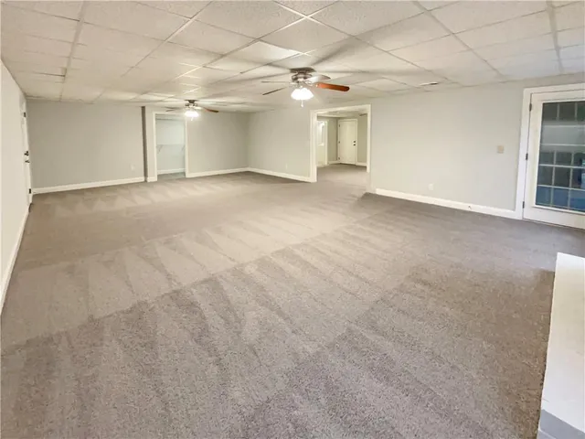 a view of empty room with windows