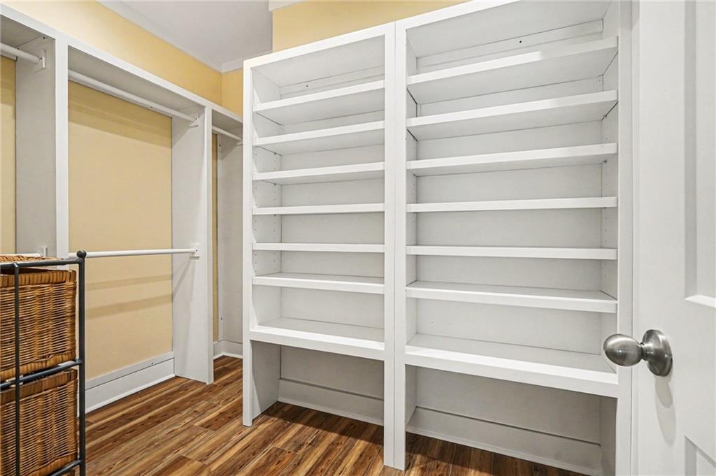 1596 Kirk-Langford Road Danielsville, GA 30633 - Photo 16 of 37 a view of walk in closet with empty racks