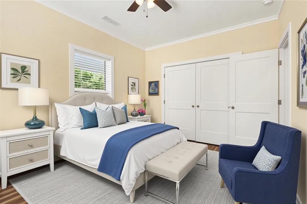 1596 Kirk-Langford Road Danielsville, GA 30633 - Photo 17 of 37 a bedroom with a bed and a couch