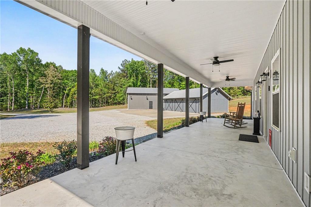 1596 Kirk-Langford Road Danielsville, GA 30633 - Photo 4 of 37 a view of a porch with seating space