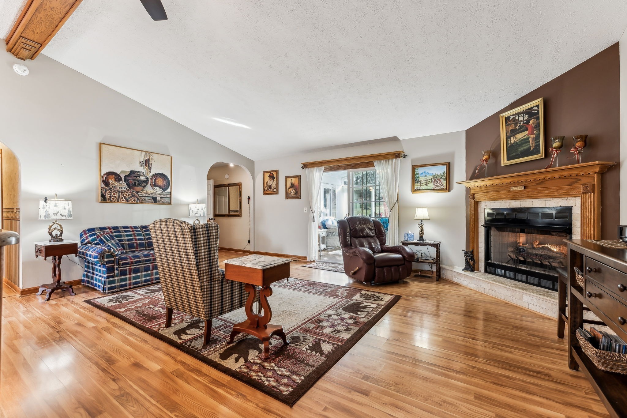 2079 Rock Springs Road Columbia, TN 38401 - Photo 12 of 83 a living room with furniture a flat screen tv and a fireplace