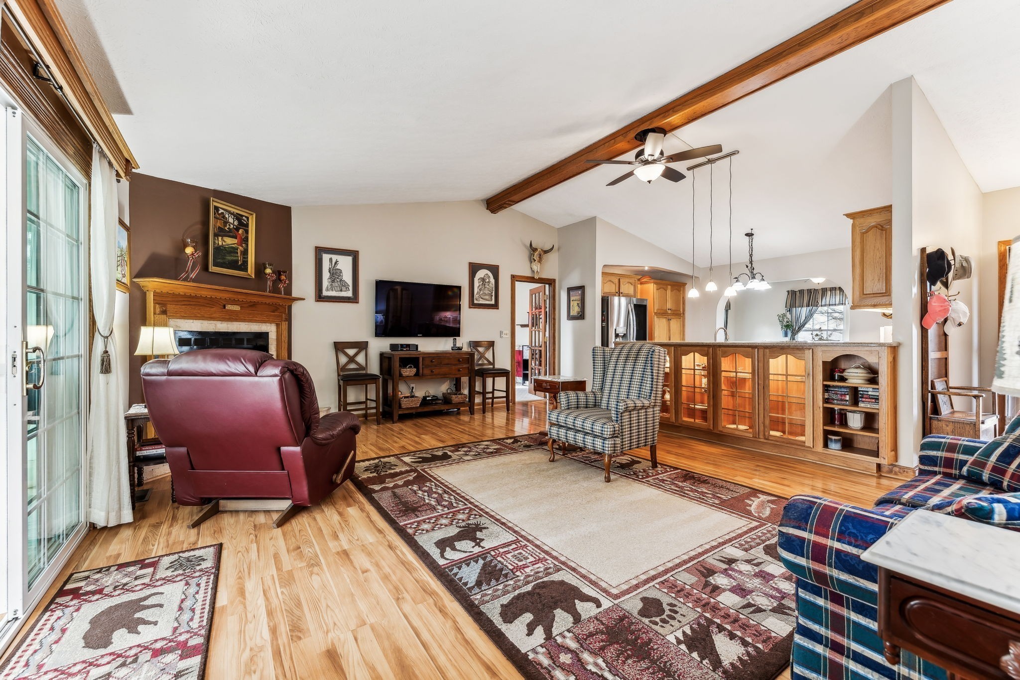 2079 Rock Springs Road Columbia, TN 38401 - Photo 15 of 83 a living room with furniture a flat screen tv and a table
