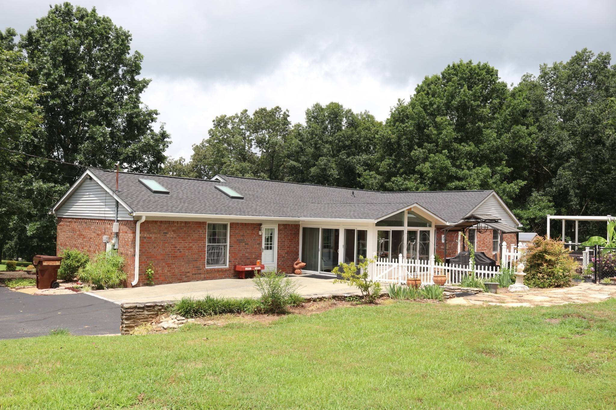 2079 Rock Springs Road Columbia, TN 38401 - Photo 7 of 83 a front view of a house with a yard table and chairs