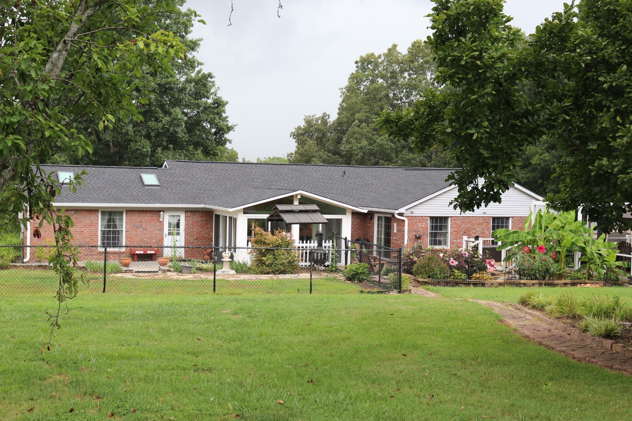 2079 Rock Springs Road Columbia, TN 38401 - Photo 8 of 83 a front view of a house with a garden