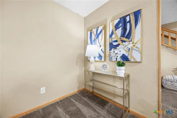 a view of wall painting and fan