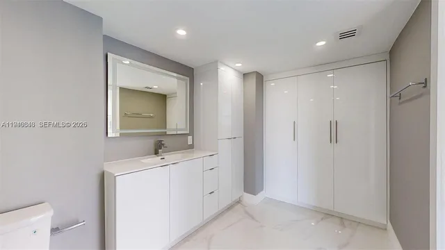 a view of a dining room with furniture and window